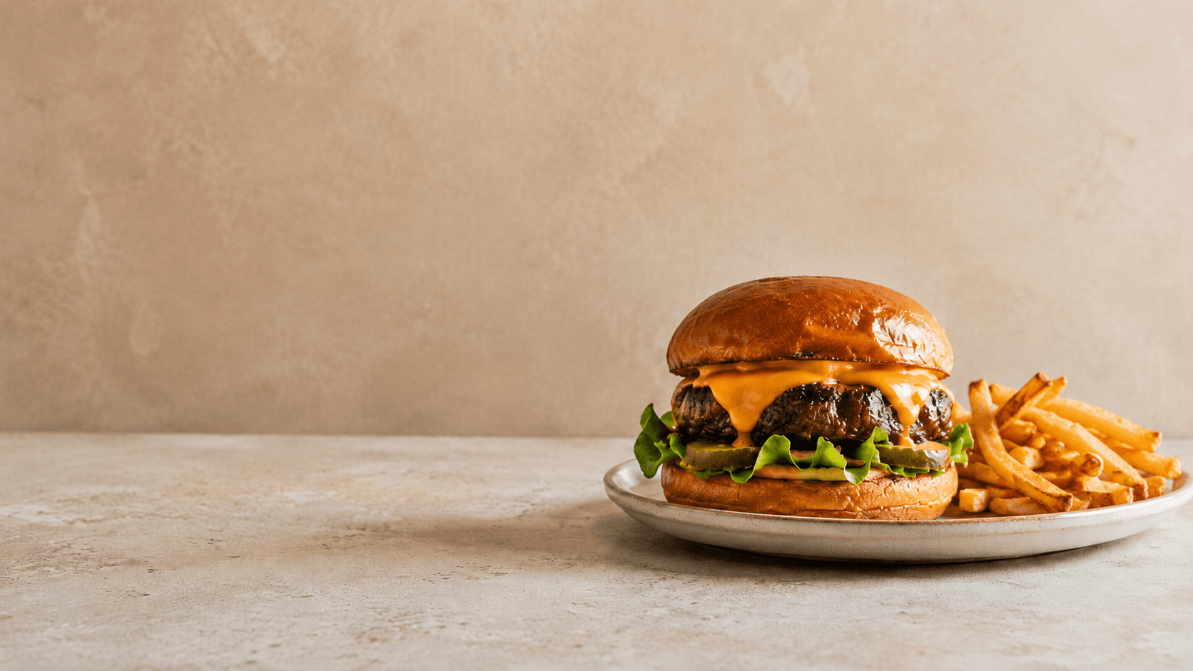 A fresh local cheeseburger and fries